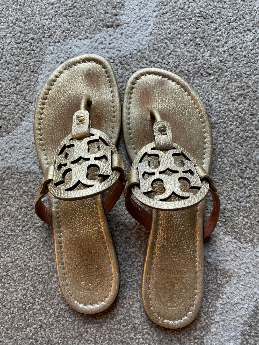 Tory Burch embossed gold sandals